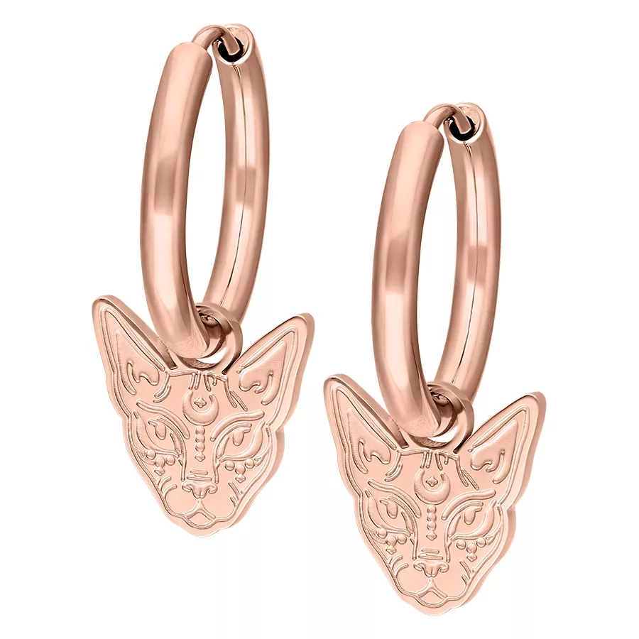 Rosékultaiset korvakorut sfinksi-riipuksella valkoisella taustalla