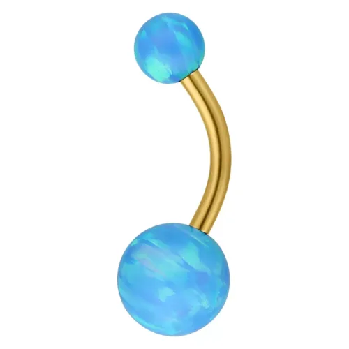 Kultainen bananabell vaaleansinisillä synteettisillä opaalipalloilla valkoisella taustalla