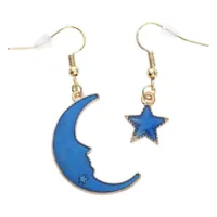 Siniset kuu- ja tähti-korvakorut messingistä Kultaiset korvakorut sinisellä kuulla ja tähdellä valkoisella taustalla