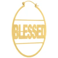 Kultaiset korvakorut 'Blessed' tekstillä valkoisella taustalla