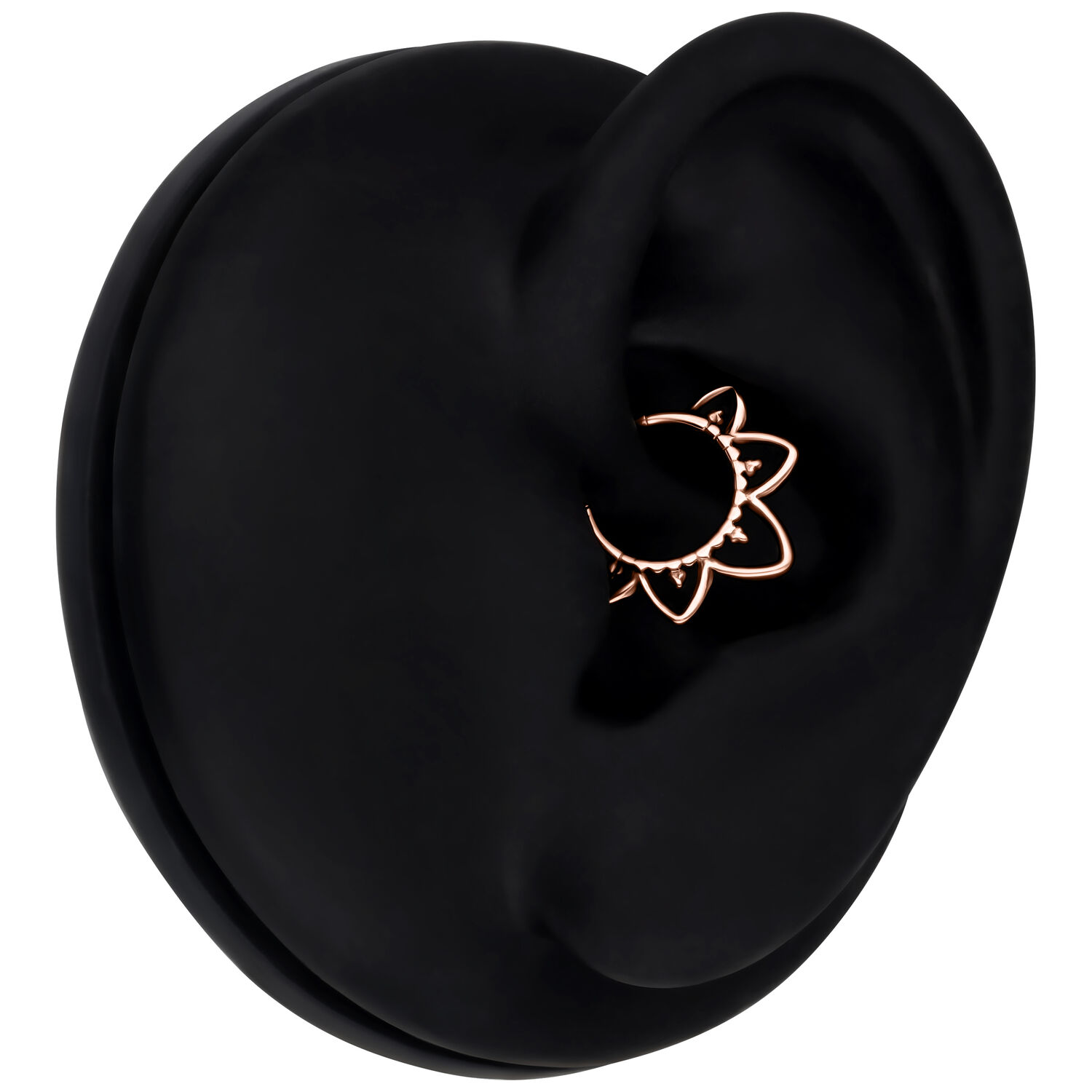 Itämainen Septum Clicker Ruusukulta Piercing Ruusukultainen septum clicker mustassa korvamallissa