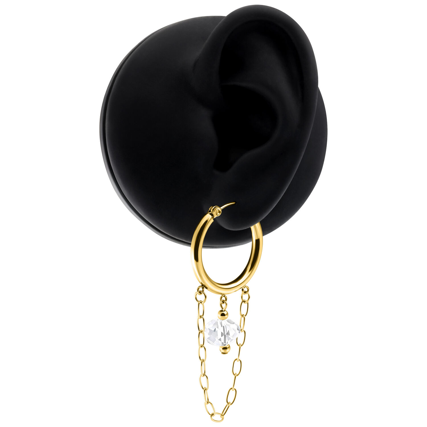 Goldene Ohrringe mit Kette und weißem Stein auf einem schwarzen Hintergrund