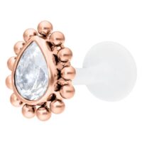 Labret ruusukullassa kristallinkirkkaalla pisaralla ja PTFE-tangolla