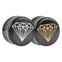 Zwei runde schwarze Hornplugs mit goldenen und platinfarbenen Diamantmotiven auf weißem Hintergrund