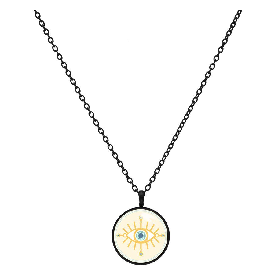 Musta kaulakoru, jossa kultainen silmäriipus valkoisella taustalla