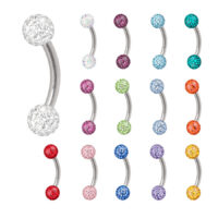 Verschiedene Titan Micro Bananabells mit bunten Kristallkugeln auf weißem Hintergrund