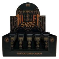 Schwarze Box mit Tattoo Pflege Creme Shots, dekorativer Schriftzug, Wildcat Marke