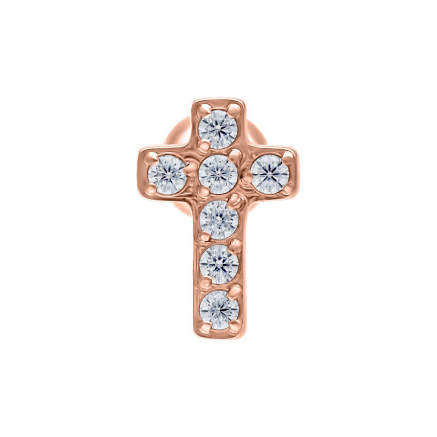 Rosékultainen korvatappi ristimuodossa, jossa on kirkkaita kristalleja valkoisella taustalla