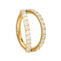 Kultainen lävistysrengas, jossa on kaksinkertainen kristallirivi valkoisella taustalla