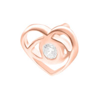 Sydämenmuotoinen ruusukultainen päällinen kirkkaalla kristallilla