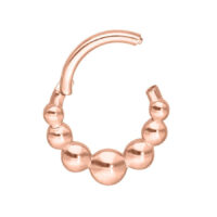 Septum Clicker ruusuhopeassa, pallokuvio valkoisella taustalla