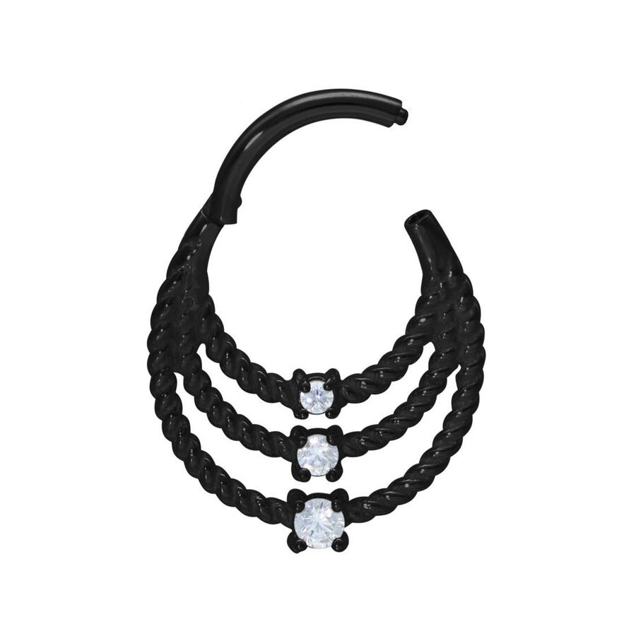 Musta lävistysrengas, jossa kolme kierrettyä kaarta ja kirkkaita kristalleja valkoisella taustalla