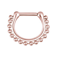 Ruusuinen septum-clicker ketjukuviolla Ruusuinen septum-clicker kirurginteräksestä ketjukuviolla valkoisella taustalla