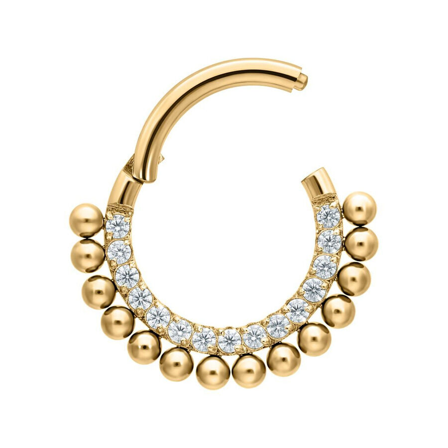 Kultainen titaani-lävistys kirkkailla kristalleilla valkoisella taustalla