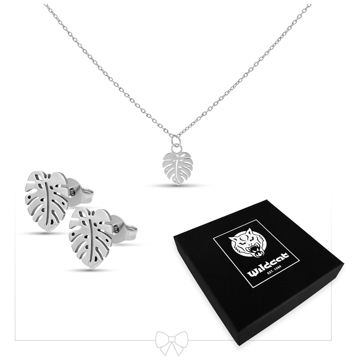 Hopeinen Monstera-korusarja kaulakorulla ja korvakoruilla valkoisella taustalla