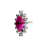 Hopeinen lävistyslisäosa, jossa on ovaali punainen kristalli, ympäröitynä hopeisilla palloilla valkoisella taustalla