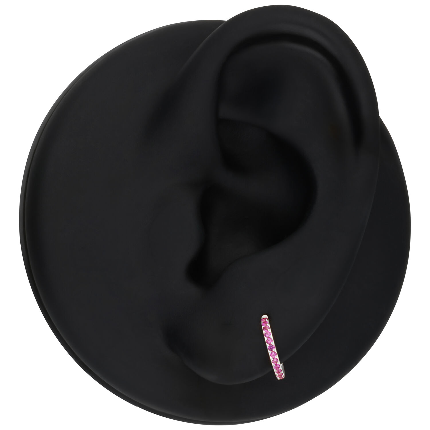 Hopeinen clicker punaisilla kristalleilla mustassa korvamallissa